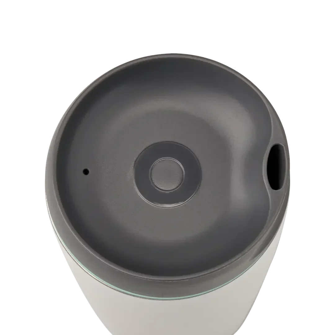 Owala SmoothSip 12oz in white body with gray lid and mint green accent ring, top view